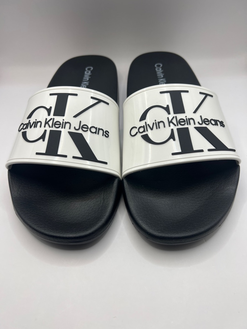 Calvin Klein Jeans White Strap Black Footbed Slide Sandals
